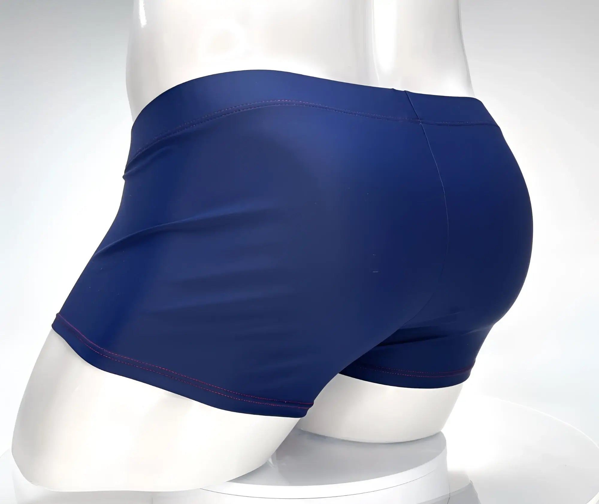 WildmanT Monster Cock swim square cut navy swim trunks with smooth stretchy fabric and subtle purple stitching along hem