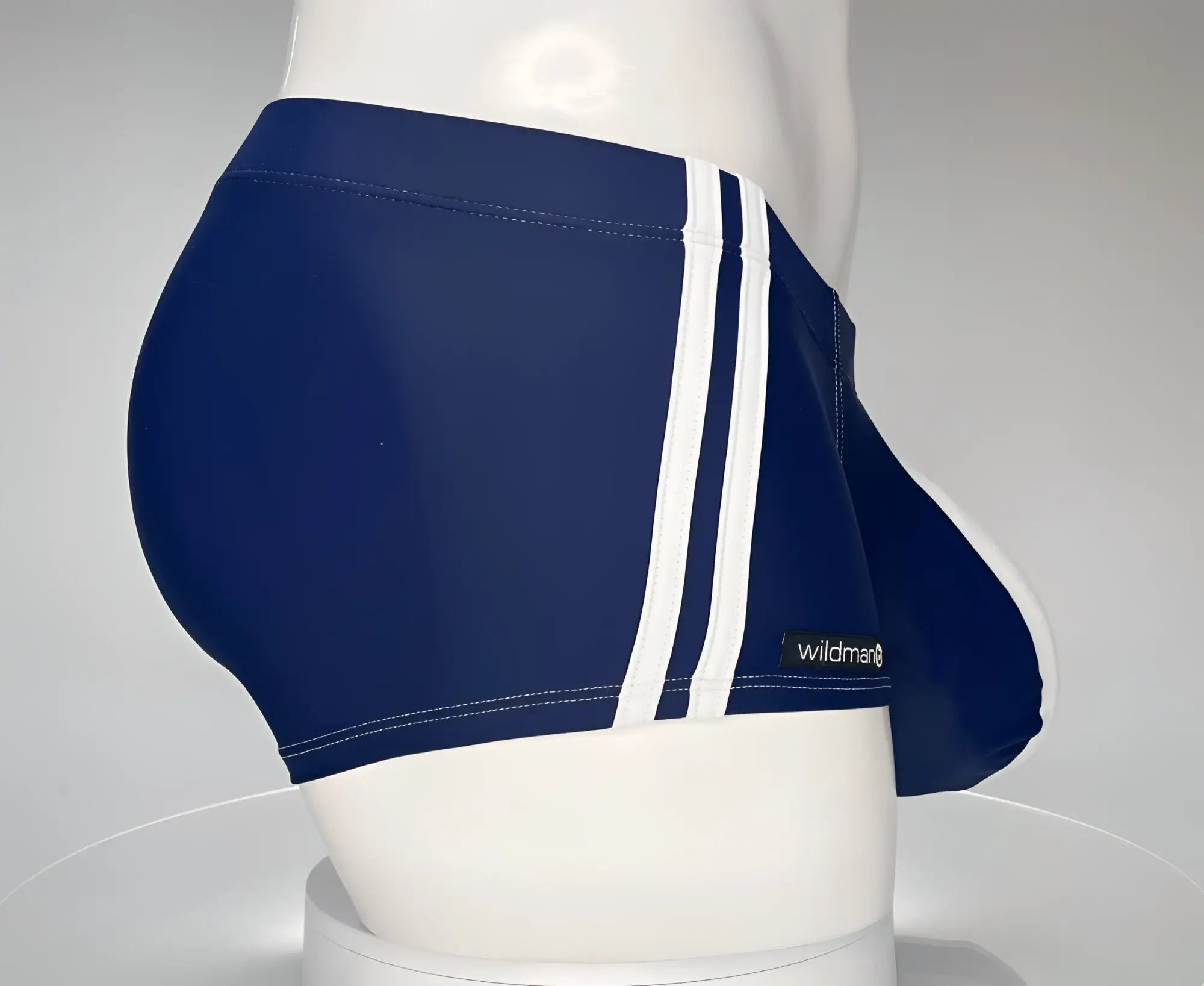 Navy blue wildmanT Monster Cock swim square cut briefs with three white stripes and wildman brand label