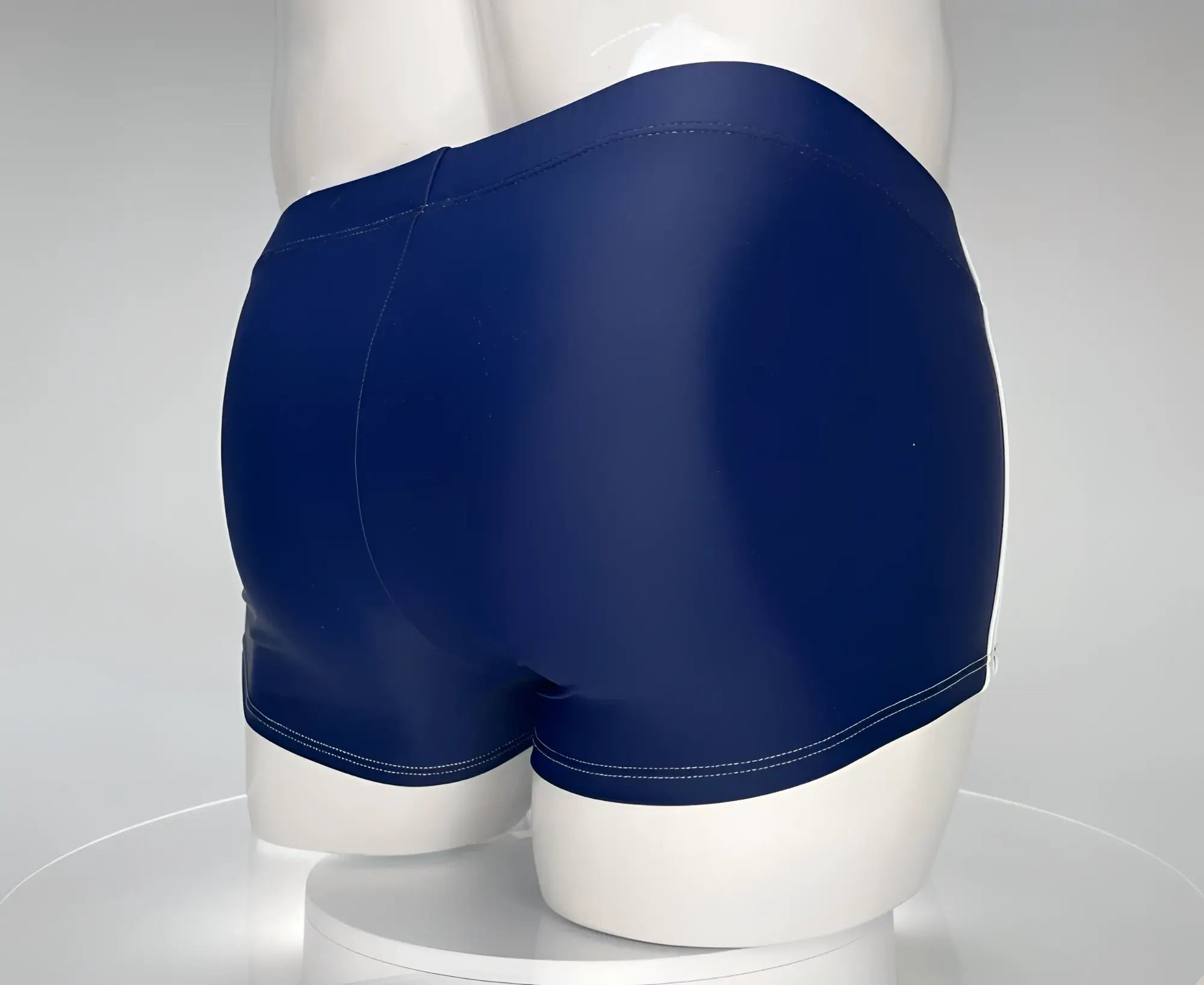 WildmanT monster cock swim square cut navy white swim trunks with glossy finish and white stitching along hem