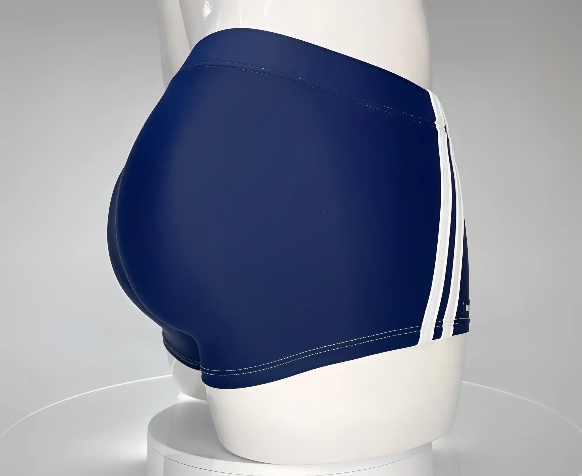 WildmanT Monster Cock swim square cut navy blue swim trunks with three white stripes down the side for men