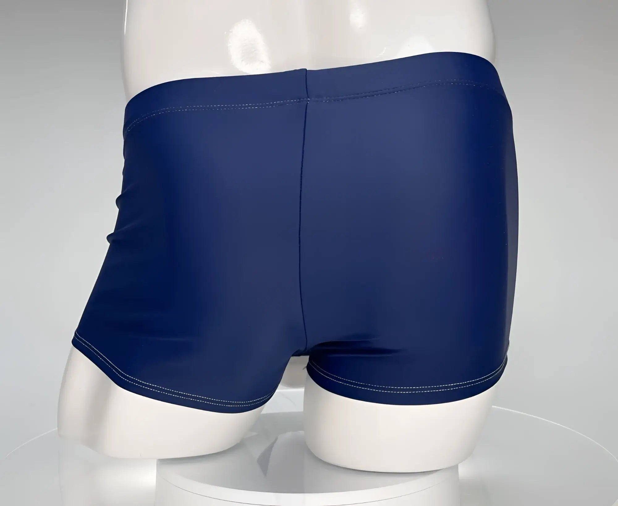 Wildmant monster cock swim square cut navy swim trunks with white stitching along waistband and leg openings