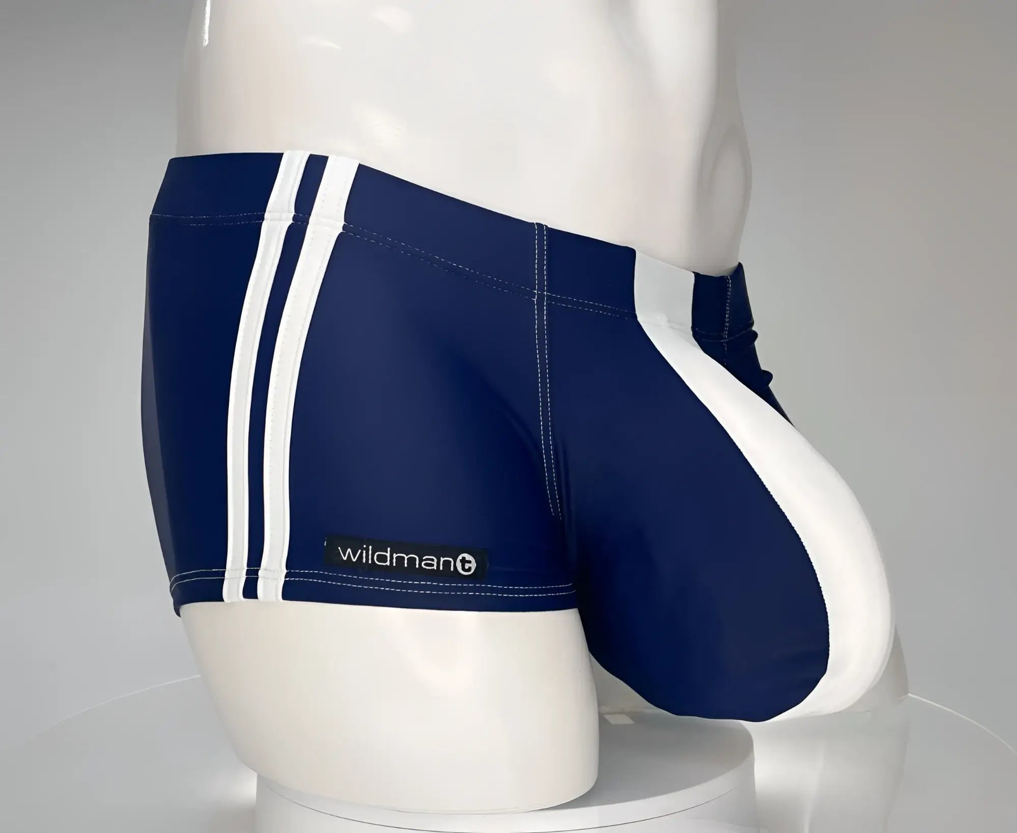 Wildmant monster cock swim square cut navy swim trunks with white side stripes and wildman logo on waistband