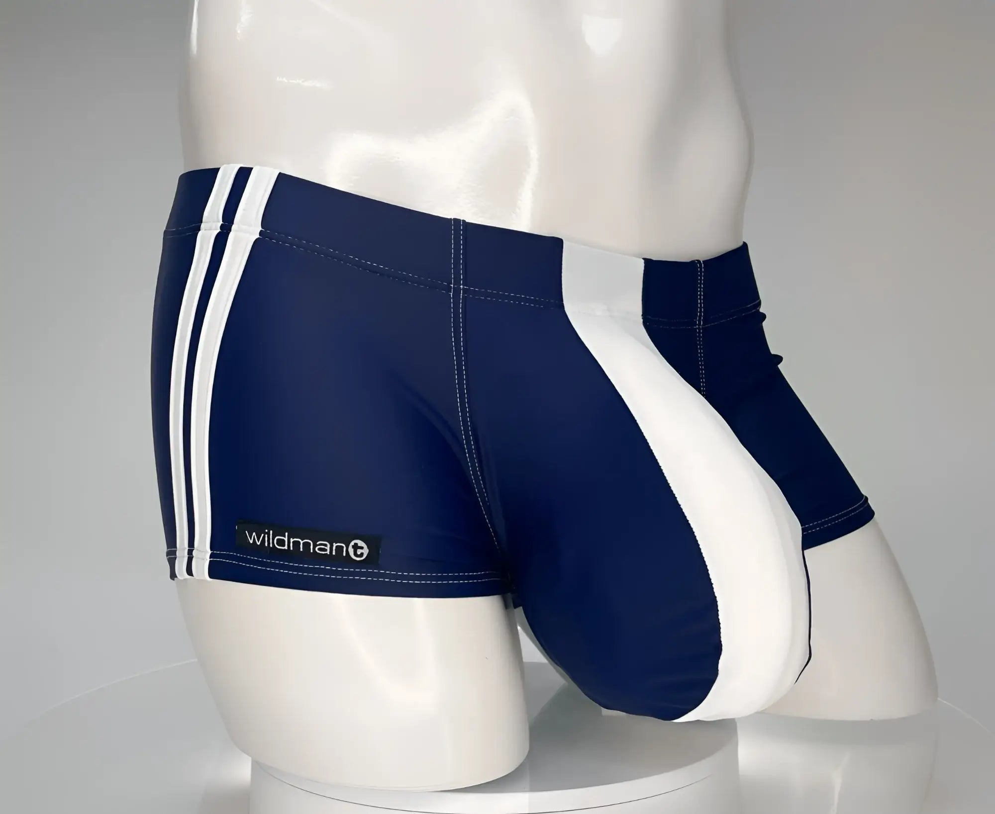 WildmanT monster cock swim square cut trunks in navy and white stripes with wildman brand label on the side