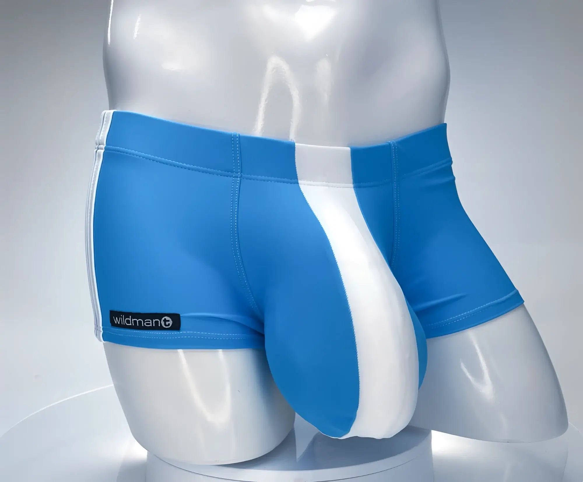 WildmanT monster cock swim square cut teal and white athletic briefs with a sleek form-fitting design