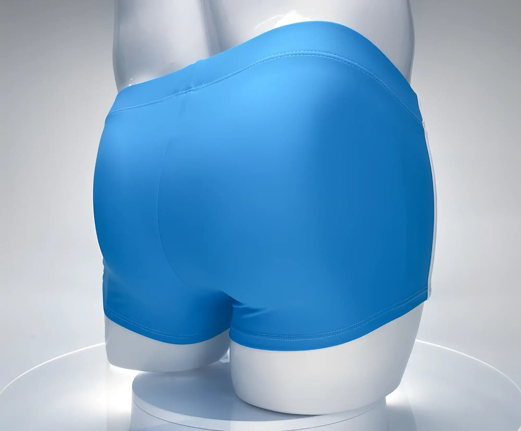 Bright blue smooth-fitting WildmanT Monster Cock swim square cut boxer briefs in teal and white on a mannequin