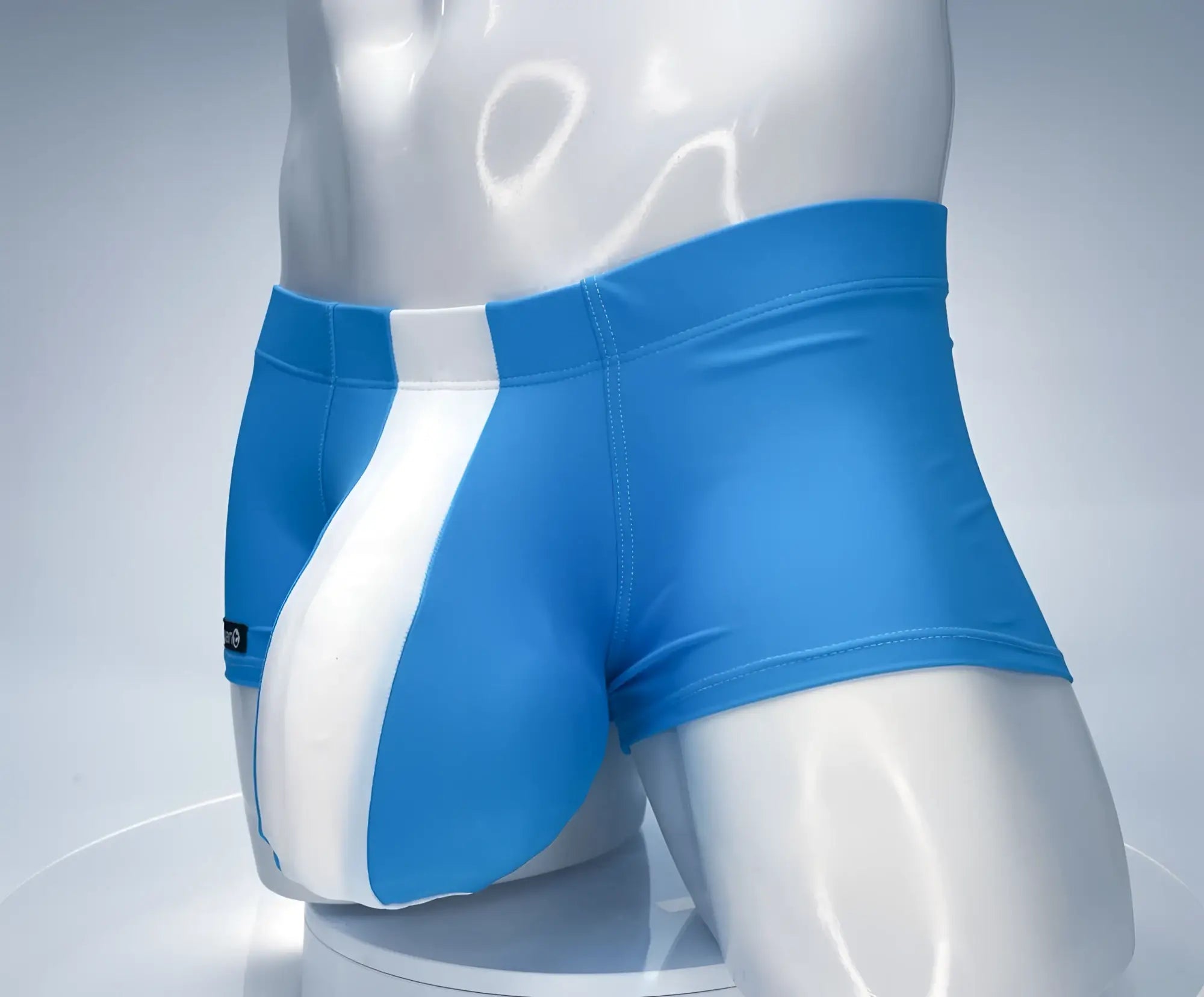 Bright blue wildmant monster cock swim square cut trunks with white diagonal stripe made from smooth stretchy fabric