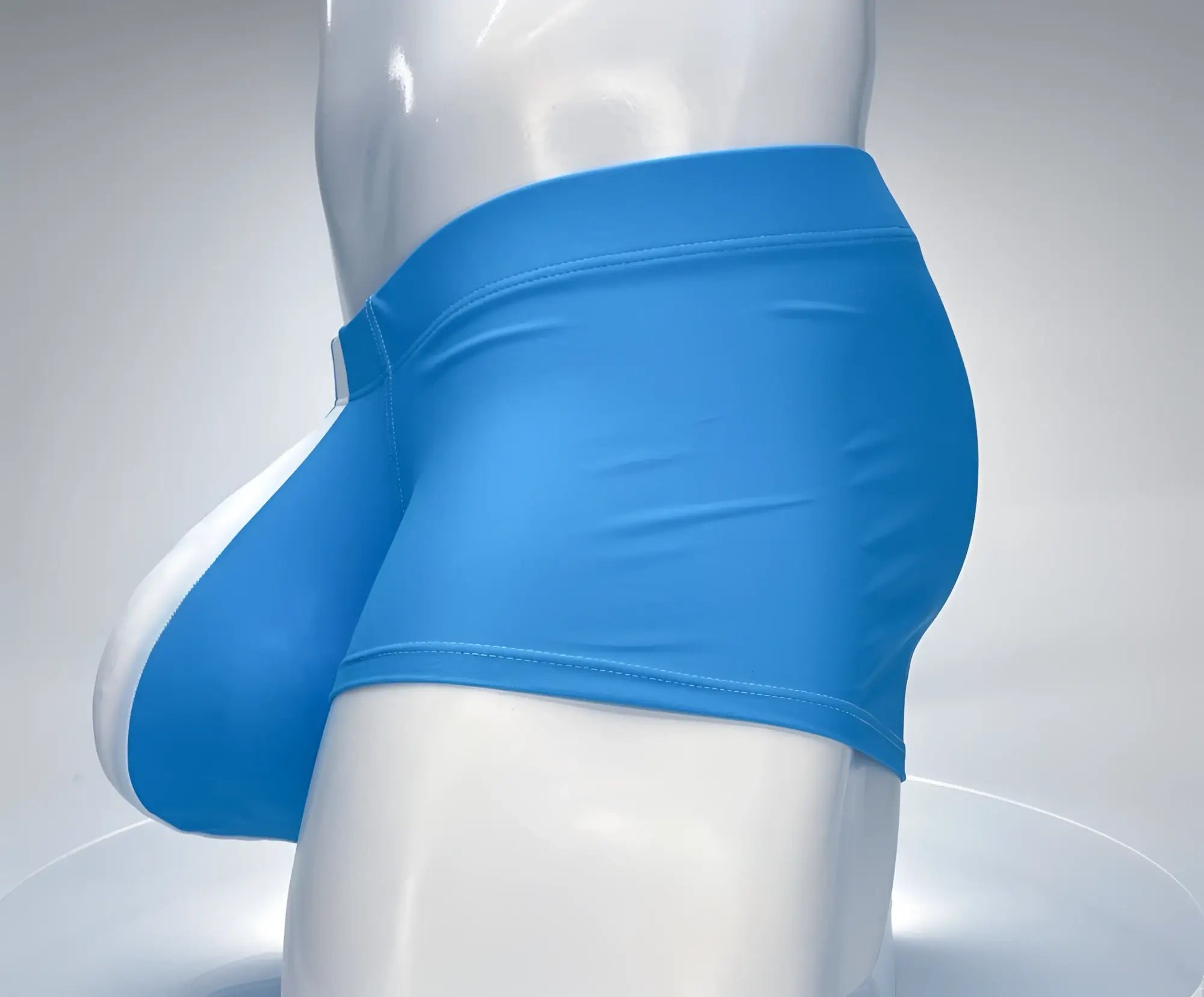WildmanT Monster Cock swim square cut teal and white swim trunks with bright blue stretchy fabric and contoured design