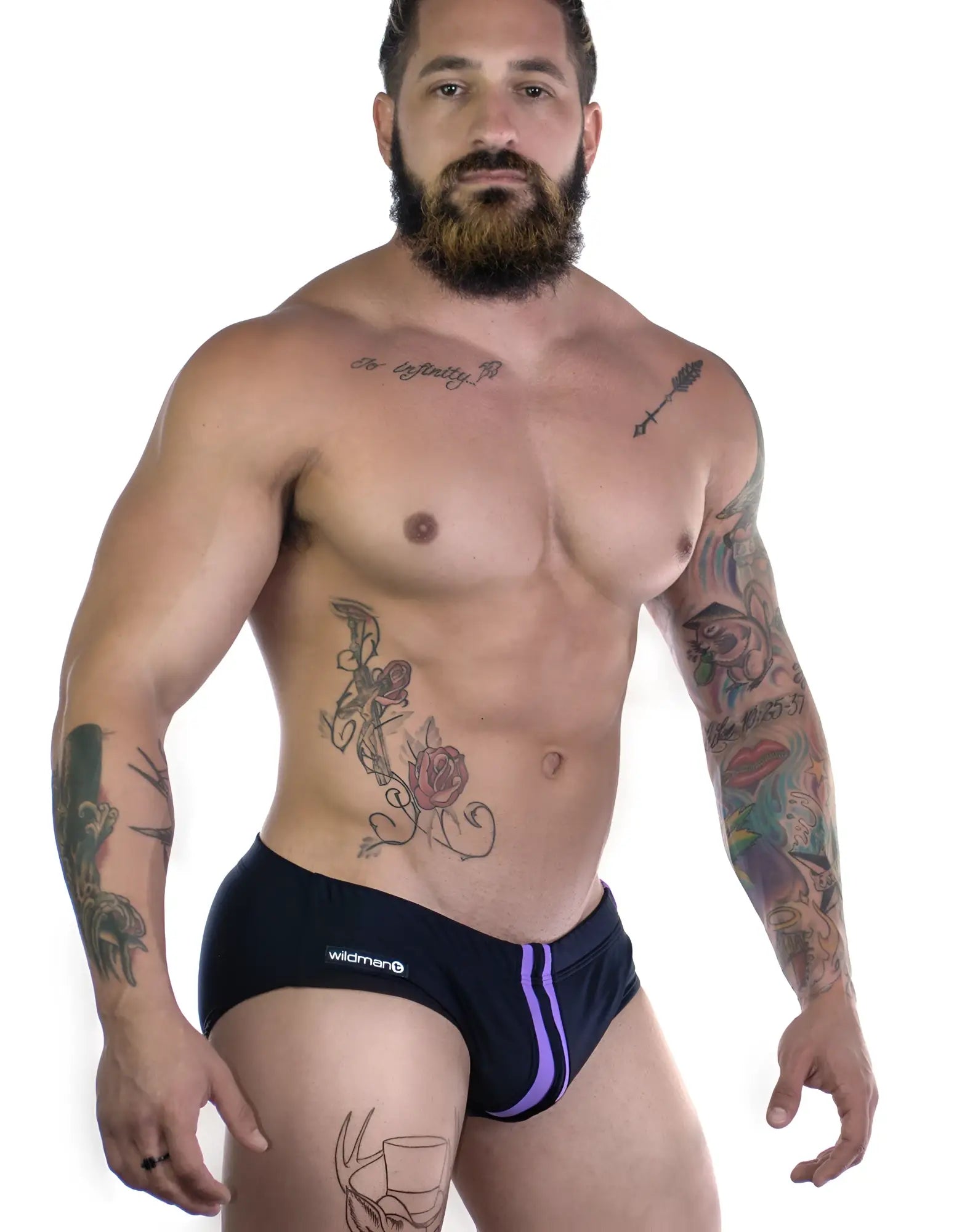 Black briefs with a purple stripe and wildmen logo on the side from WildmanT Sportivo Bikini Black and Purple collection