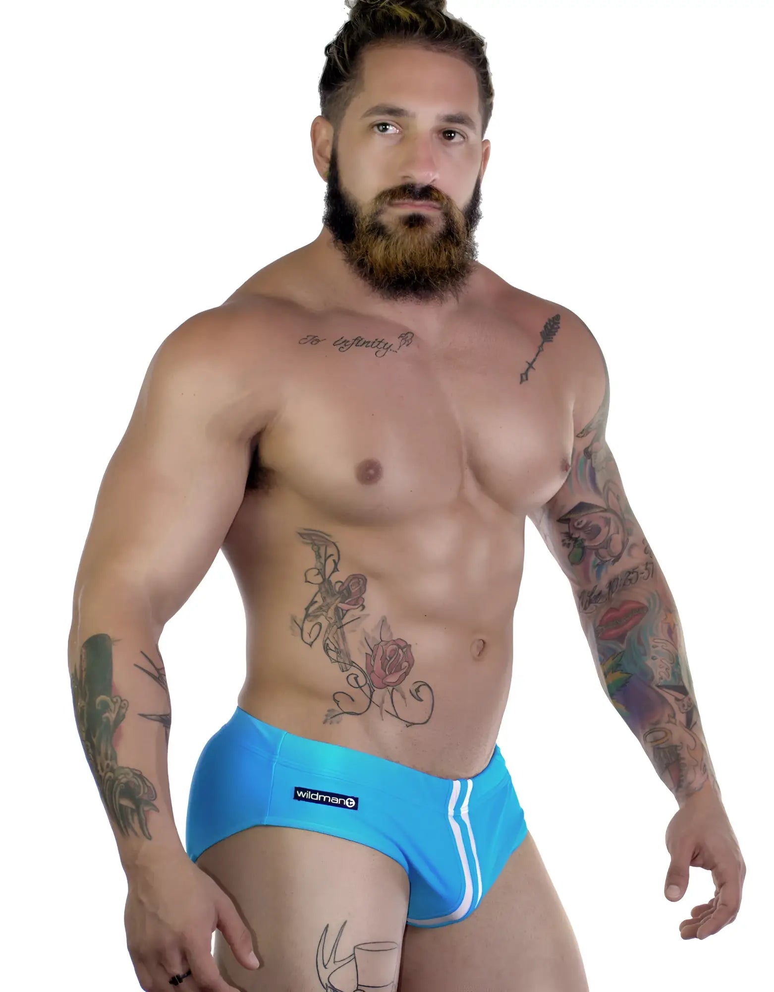 Wildman sportivo bikini teal bright blue form-fitting swim trunks with white side stripes and black wildman logo on left hip