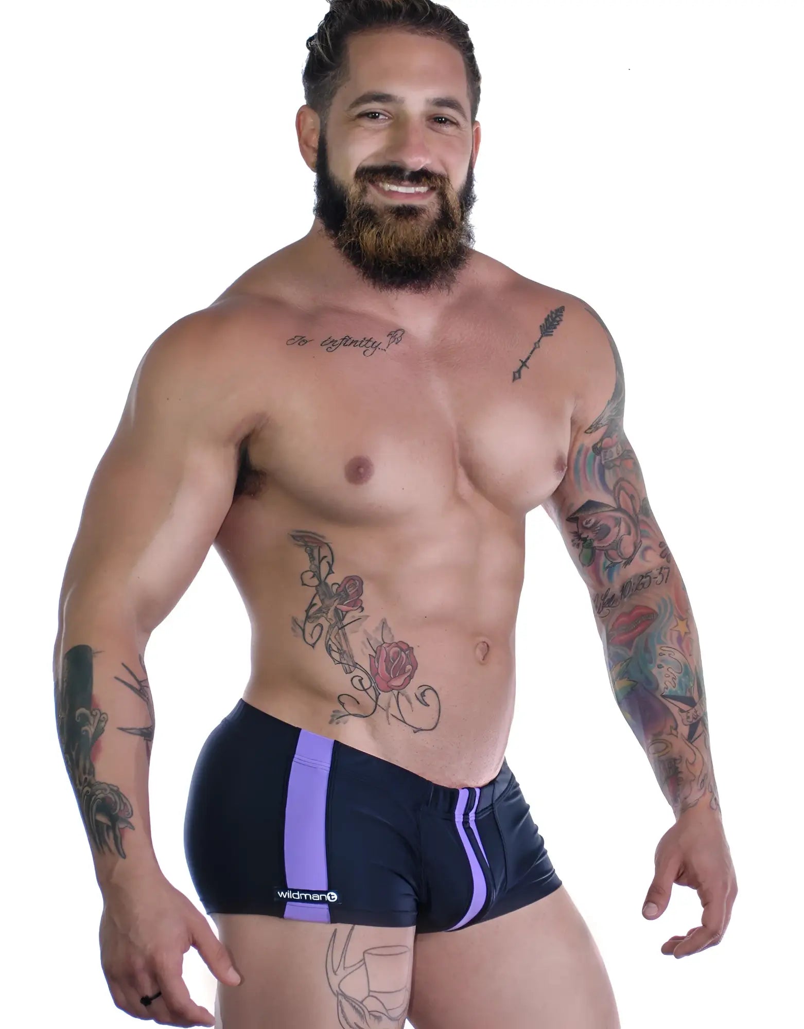 WildmanT Sportivo square cut black swim trunks with vibrant purple side stripes and a subtle white logo on the leg