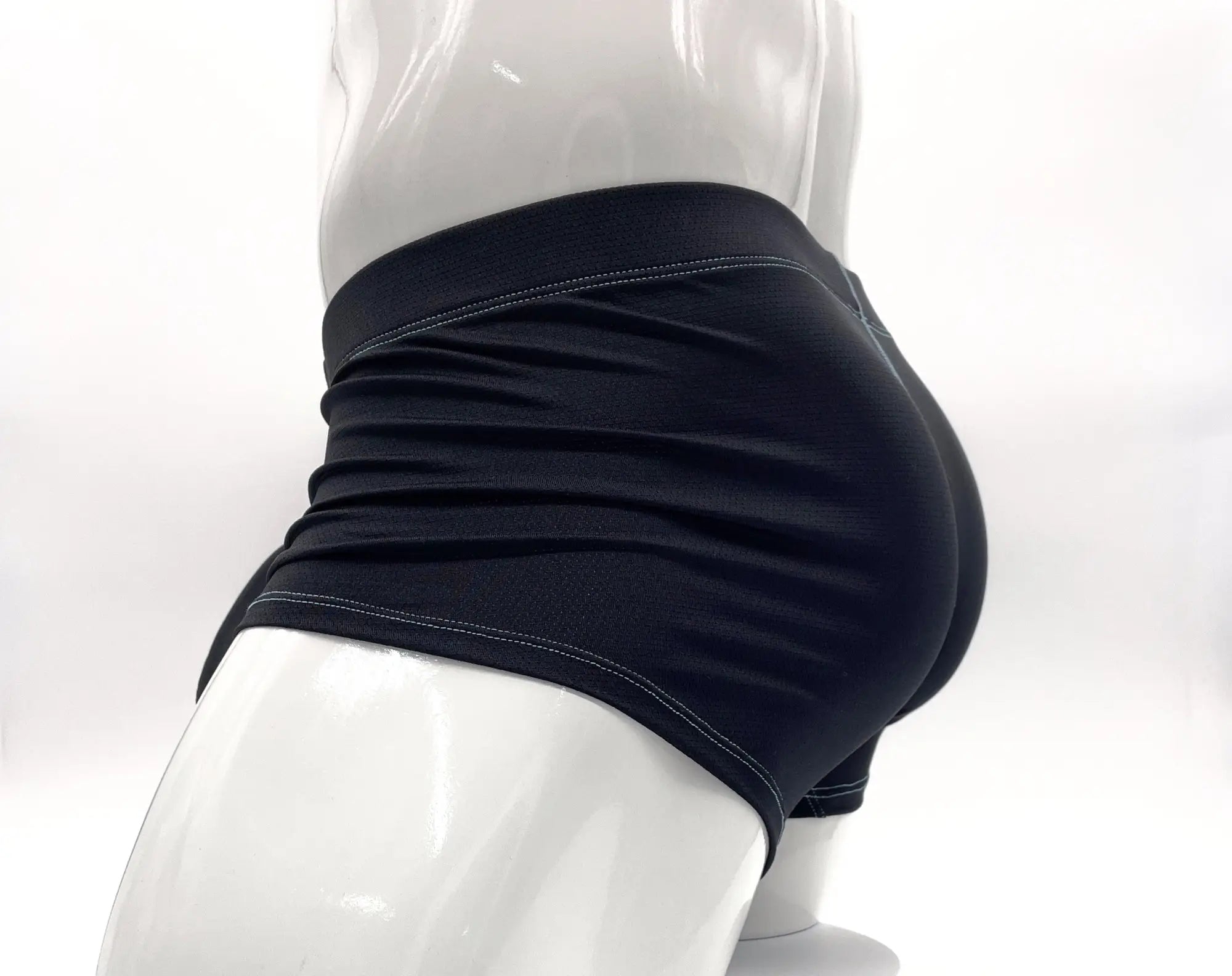 Wildmant stitch big boy pouch boxer brief blue in black athletic fabric with snug fit and subtle white waistband stitching