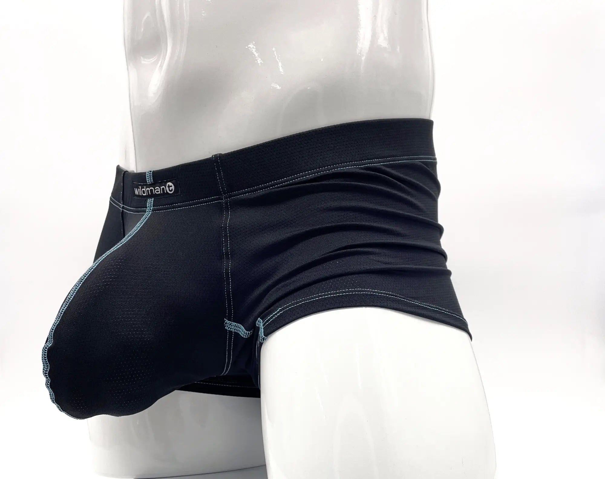 Wildmant stitch big boy pouch boxer brief in black with light blue stitching and wildman brand label on waistband