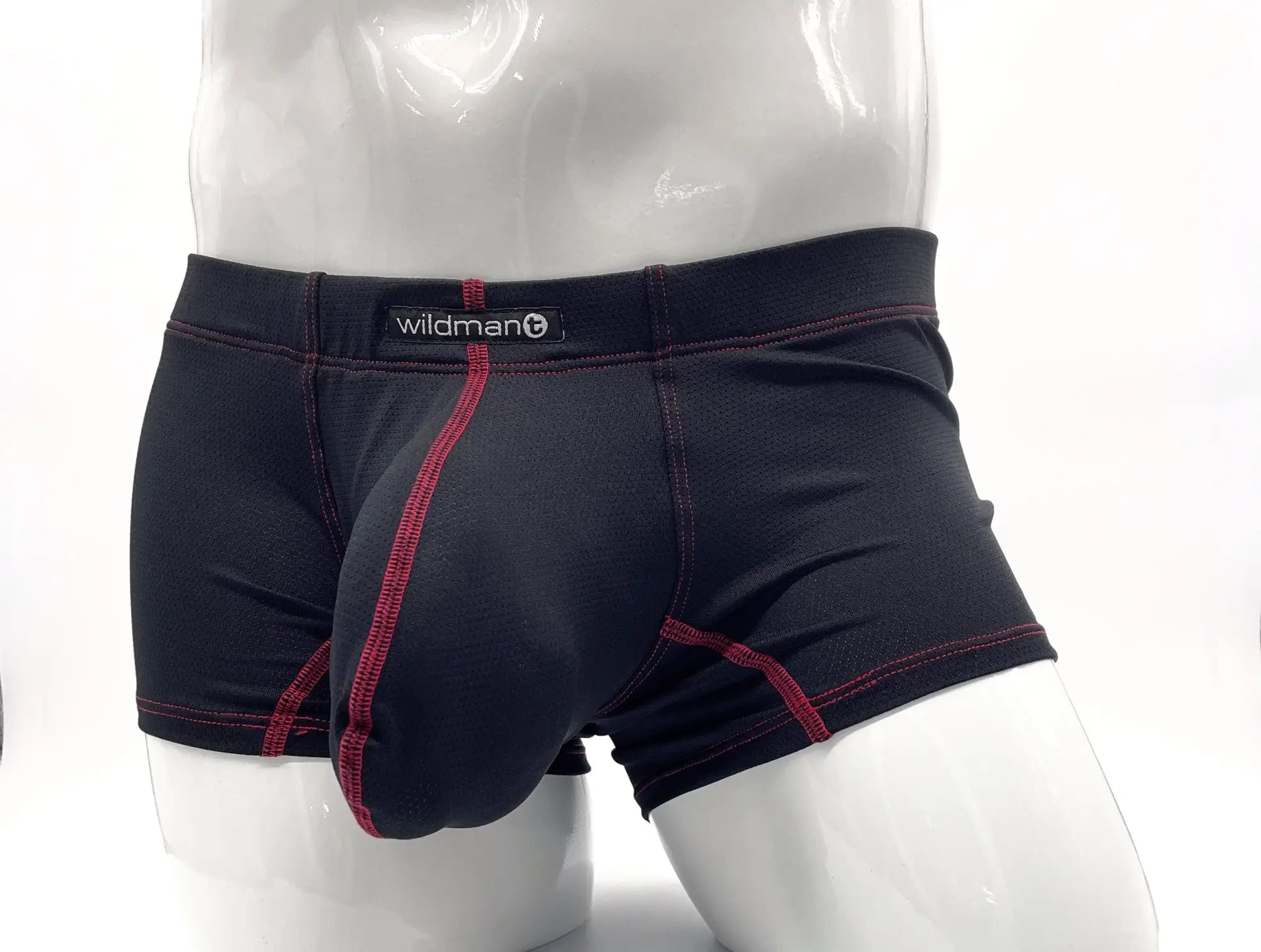Black men’s boxer briefs with red stitching and wildman brand label on waistband in wildmant stitch big boy pouch design