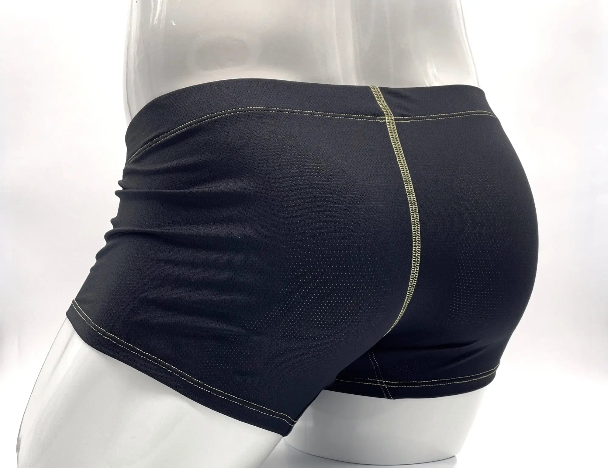Wildmant stitch big boy pouch boxer brief yellow showing the back side with black mesh shorts and light green stitching