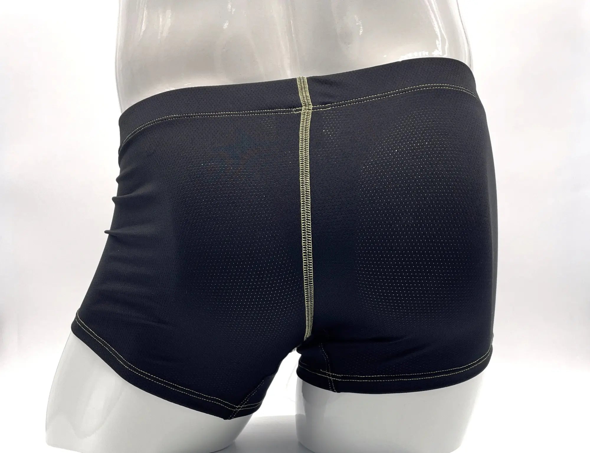 Wildmant stitch big boy pouch boxer brief in black mesh with yellow stitching along center seam and waistband