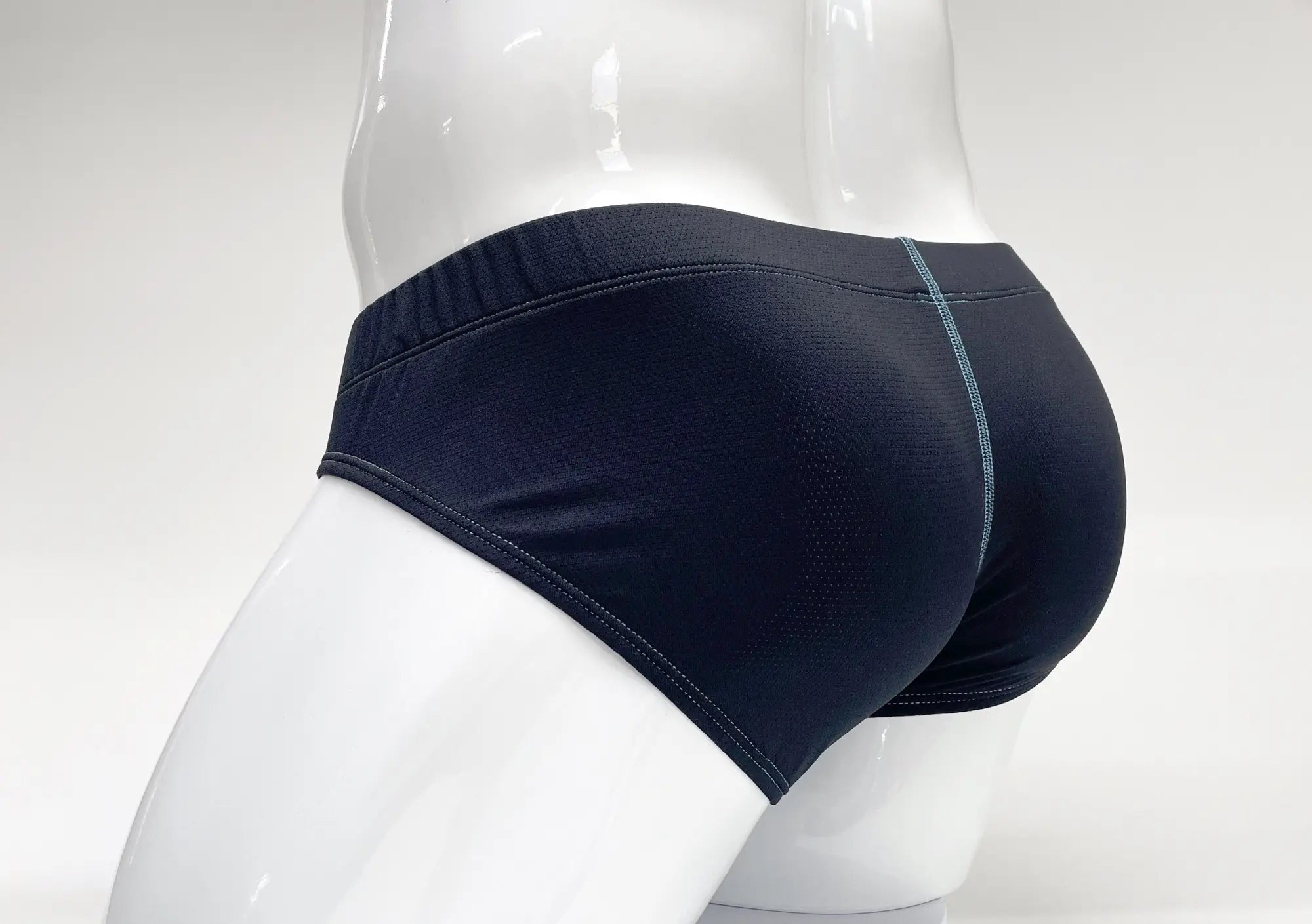 Wildmant stitch big boy pouch brief in black with subtle gray seam detail designed for athletic use