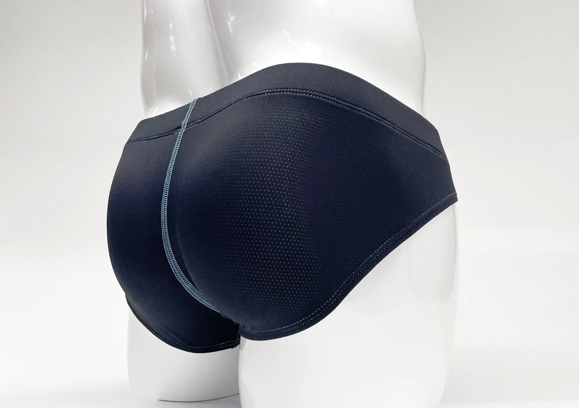 WildmanT Stitch big boy pouch brief in blue featuring black athletic fabric with textured mesh panel and gray stitching