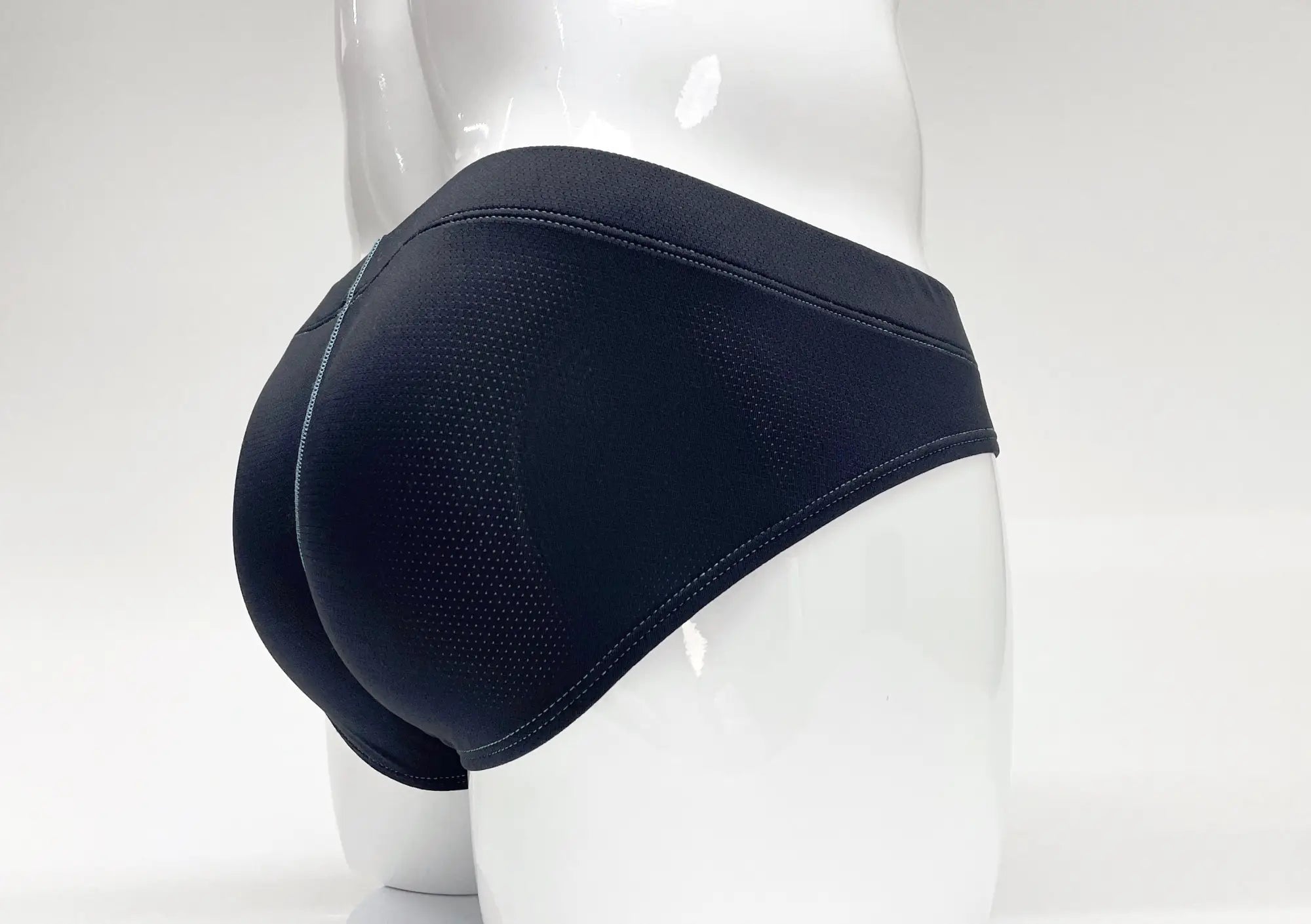 Wildmant stitch big boy pouch brief in blue with black mesh fabric and smooth elastic waistband front view