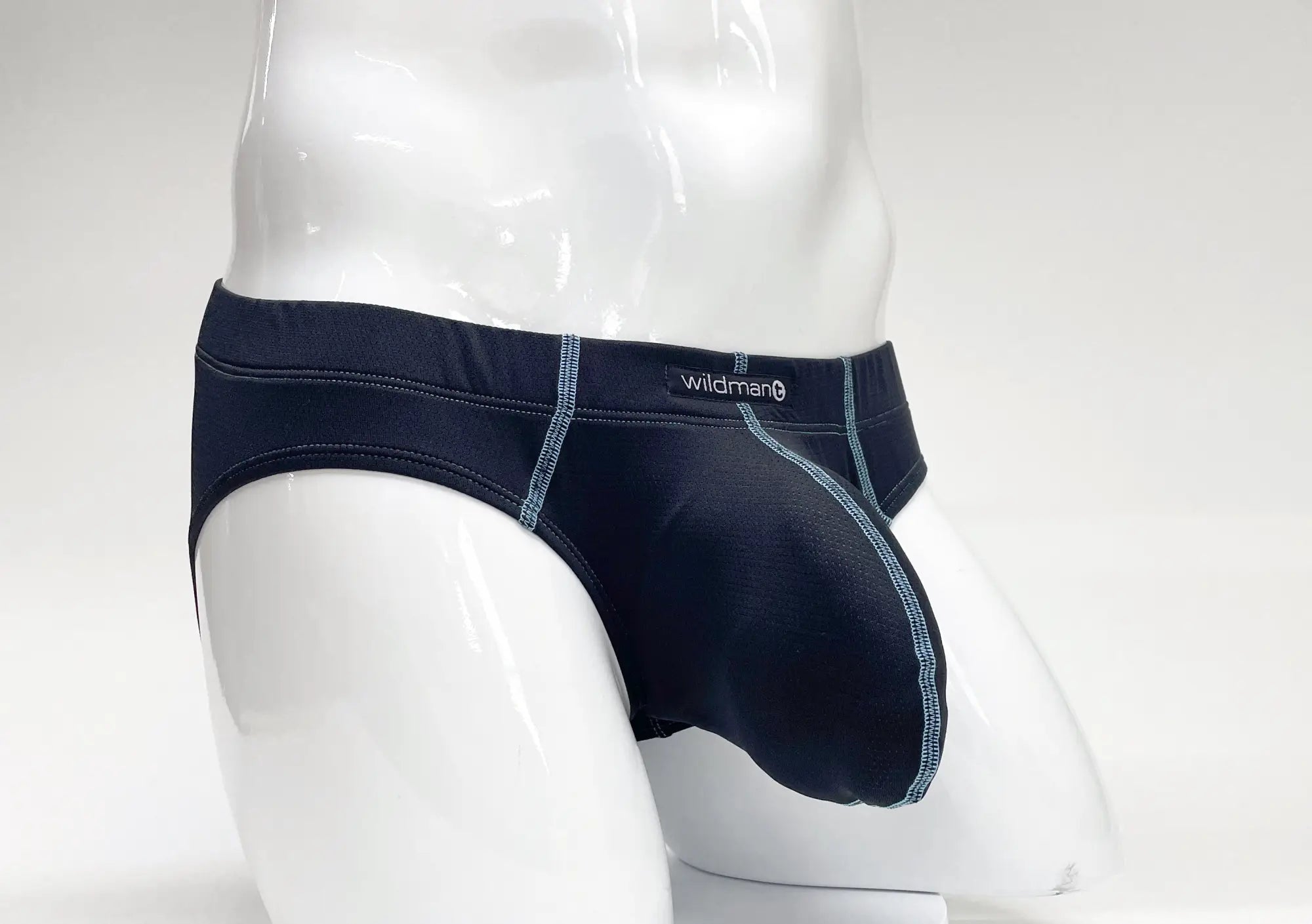 WildmanT stitch big boy pouch brief in black with contrasting light gray stitching along seams for comfortable support