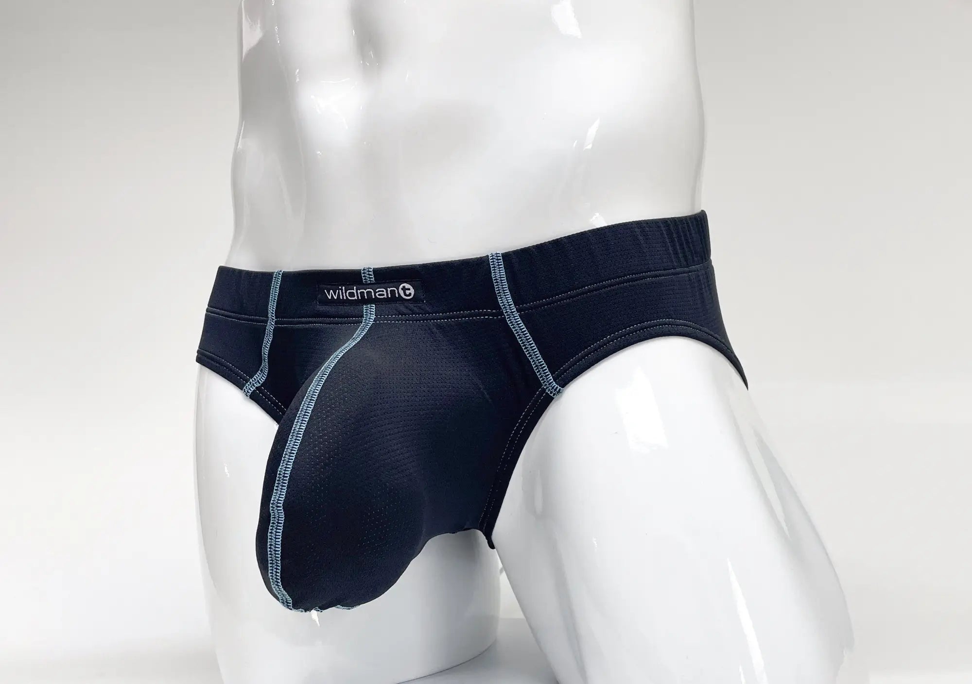 WildmanT Stitch big boy pouch brief in dark navy blue with light gray stitching and wildman label on waistband