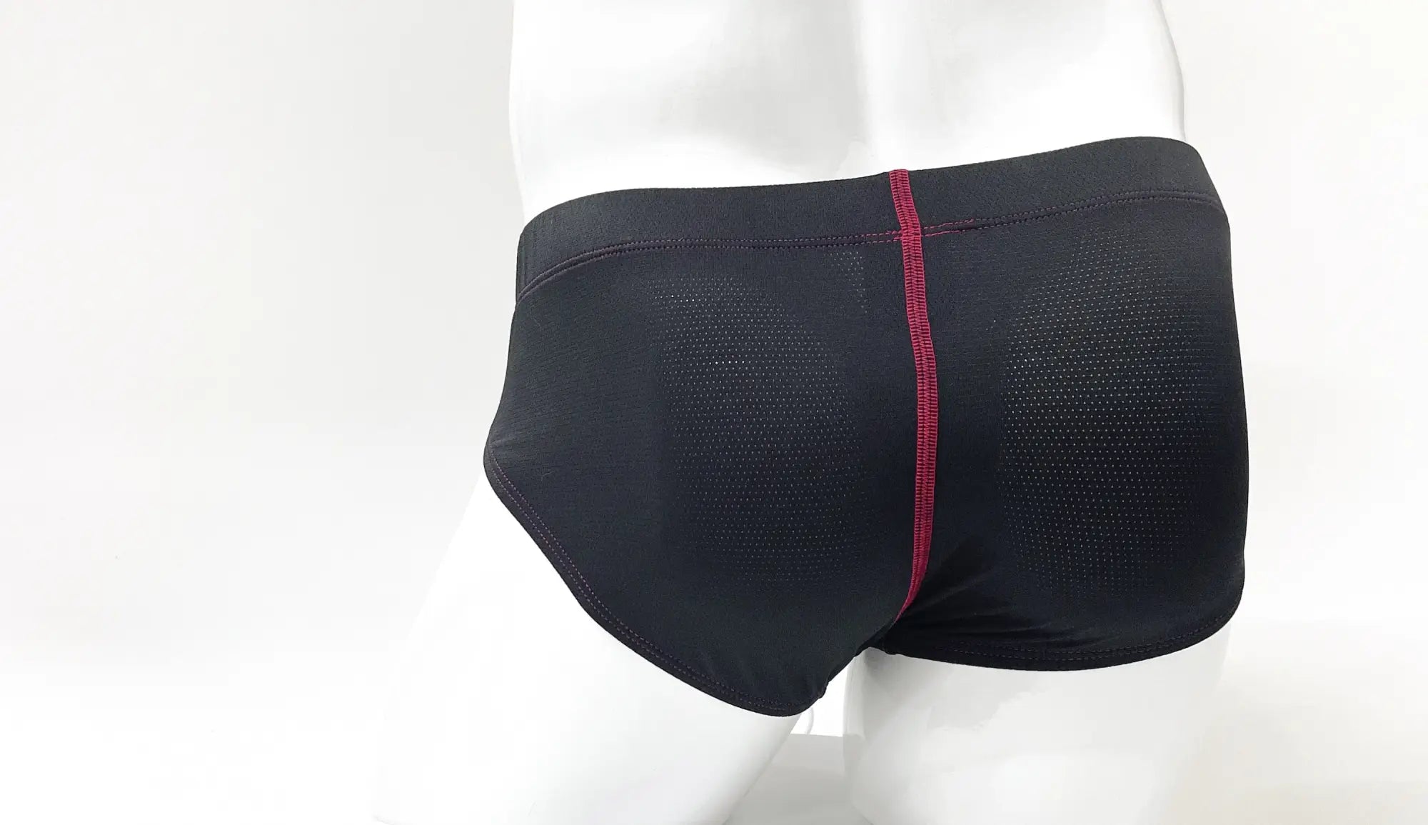 Black wildmant stitch big boy pouch brief with red central seam and mesh panels on the back