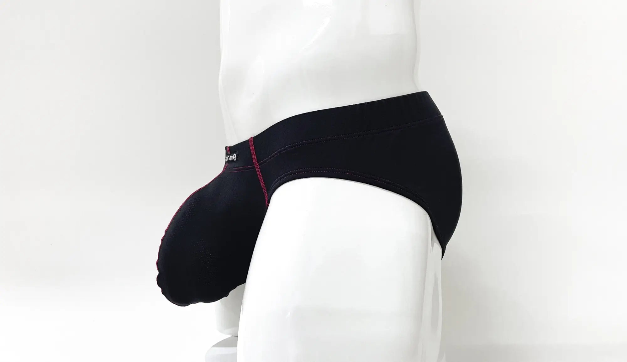 WildmanT stitch big boy pouch brief in black with subtle red stitching along the side seam for comfortable support