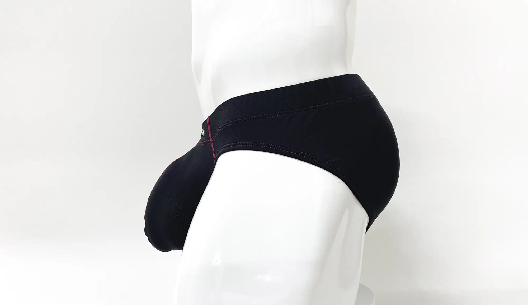 Wildmant stitch big boy pouch brief in black with subtle red stitching along the waistband for comfortable support