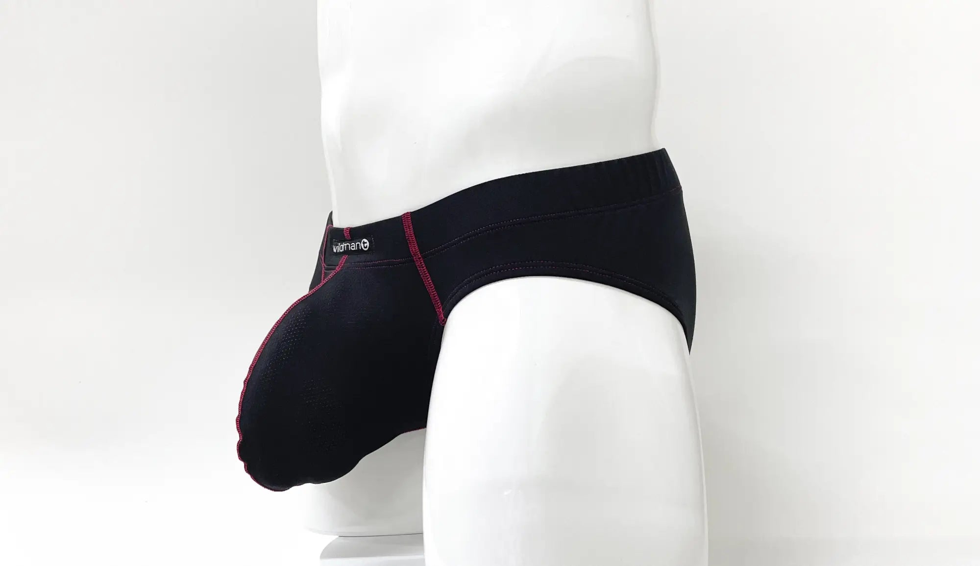 Wildmant stitch big boy pouch brief in black with red stitching and a small white logo on the waistband