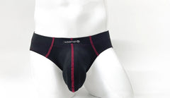 Black men’s briefs with red stitching and wildman brand label designed for comfort and support in wildmant stitch big boy