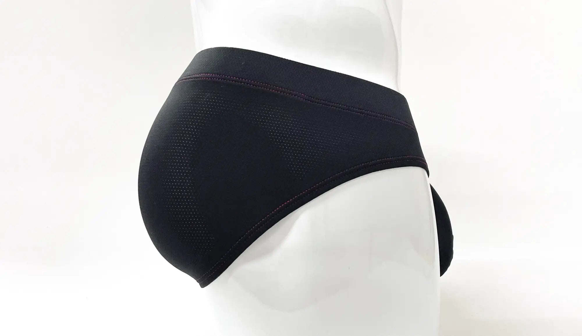 Wildmant stitch big boy pouch brief in red featuring black mesh fabric and a smooth elastic waistband