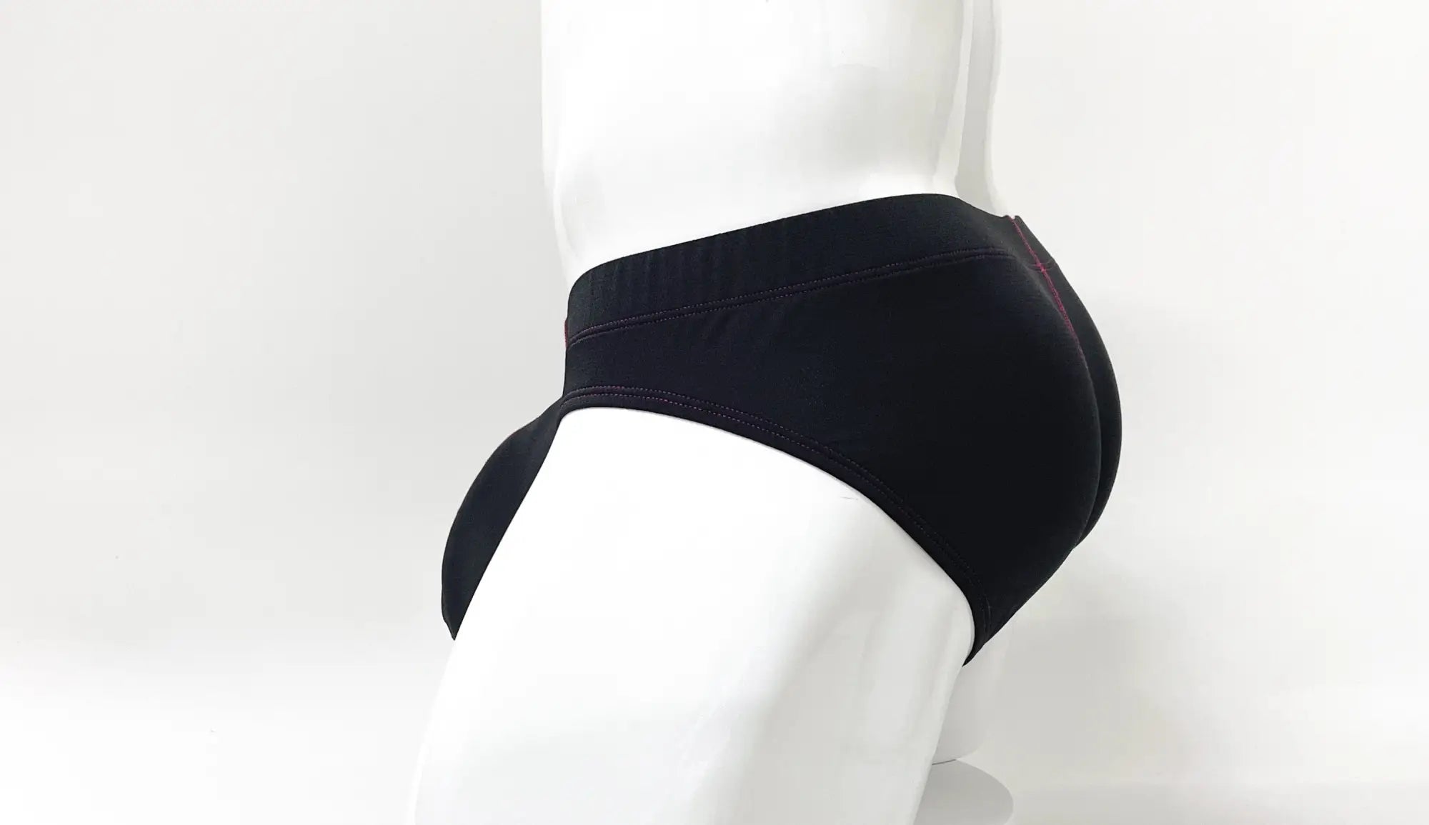 Wildmant stitch big boy pouch brief in red with smooth form-fitting fabric and subtle stitching along the waistband