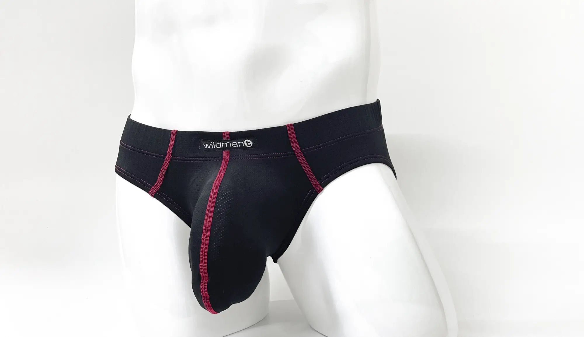 WildmanT stitch big boy pouch brief in black with red stitching along seams and waistband designed for comfort