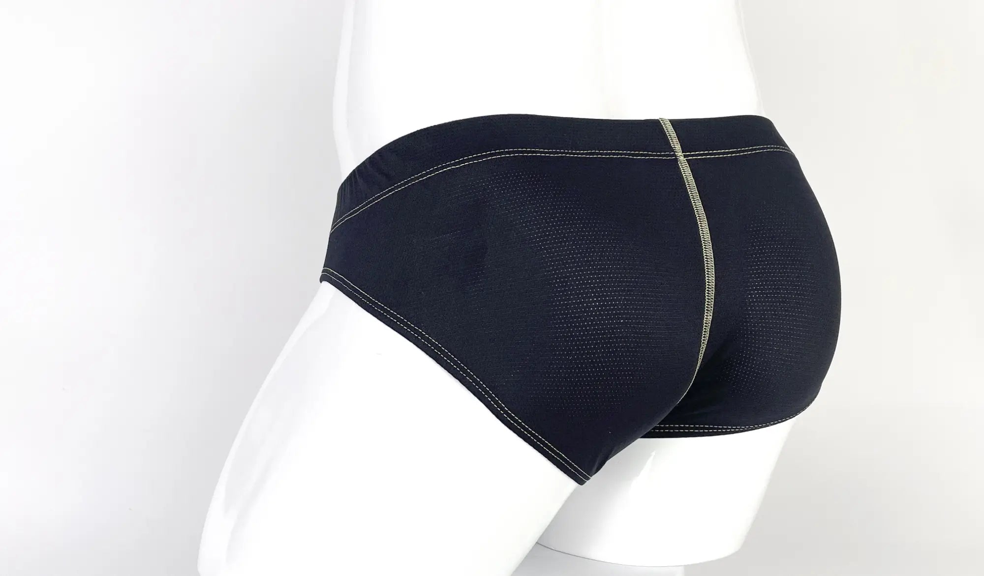 WildmanT Stitch big boy pouch brief in yellow features black mesh with contrasting light gray stitching on waistband and legs