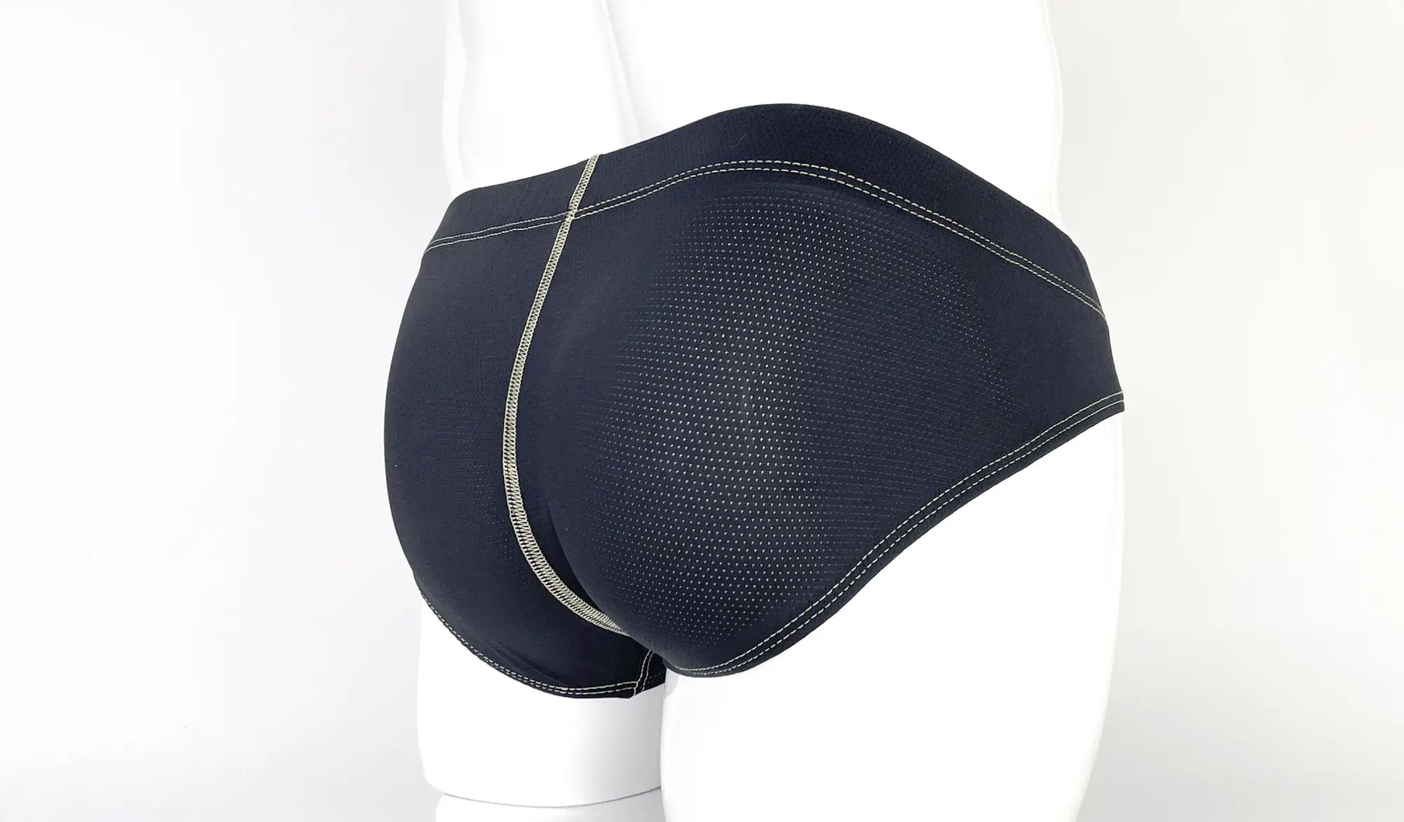 Wildmant stitch big boy pouch brief yellow in black mesh with contrasting silver stitching along waistband and leg openings