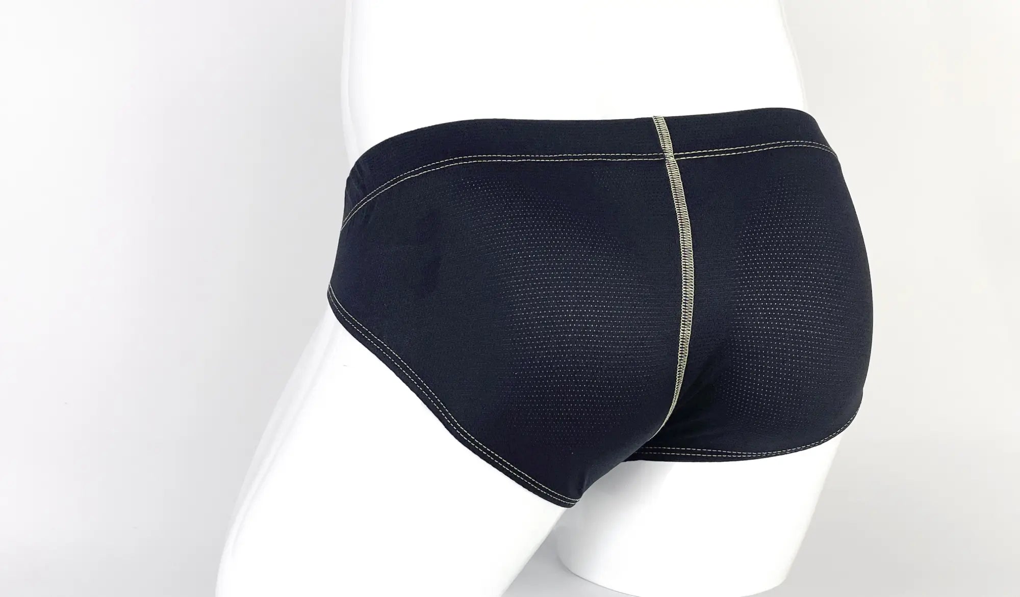 Wildmant stitch big boy pouch brief in yellow featuring black mesh material with a subtle gray center seam