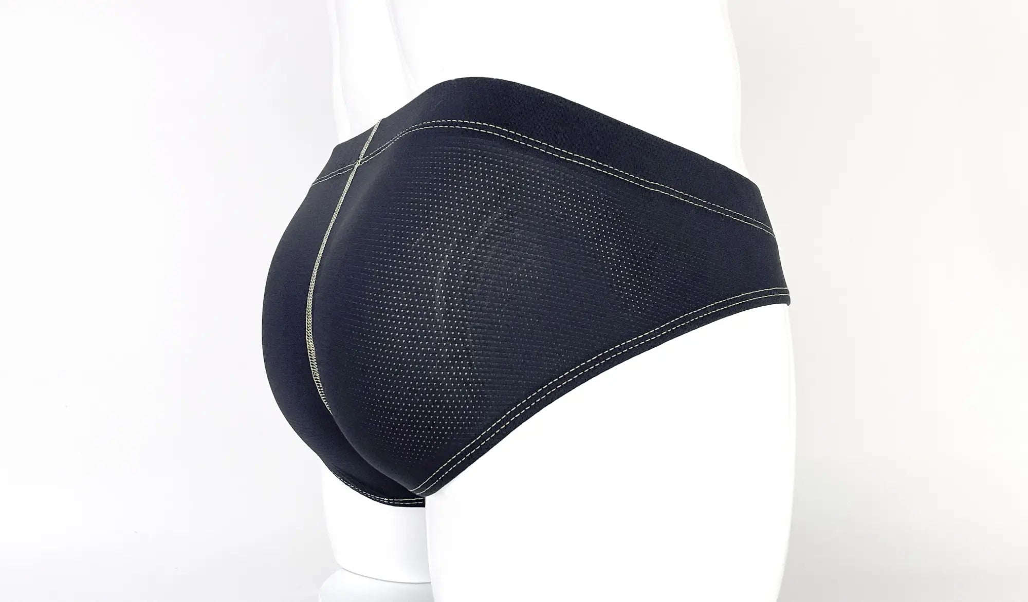 WildmanT Stitch Big Boy Pouch Brief yellow with black mesh fabric and white stitching along the edges