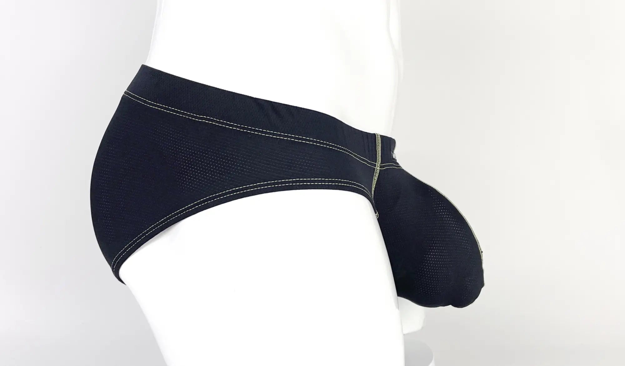 Wildmant stitch big boy pouch brief in yellow mesh with contrasting white stitching and a supportive contoured design