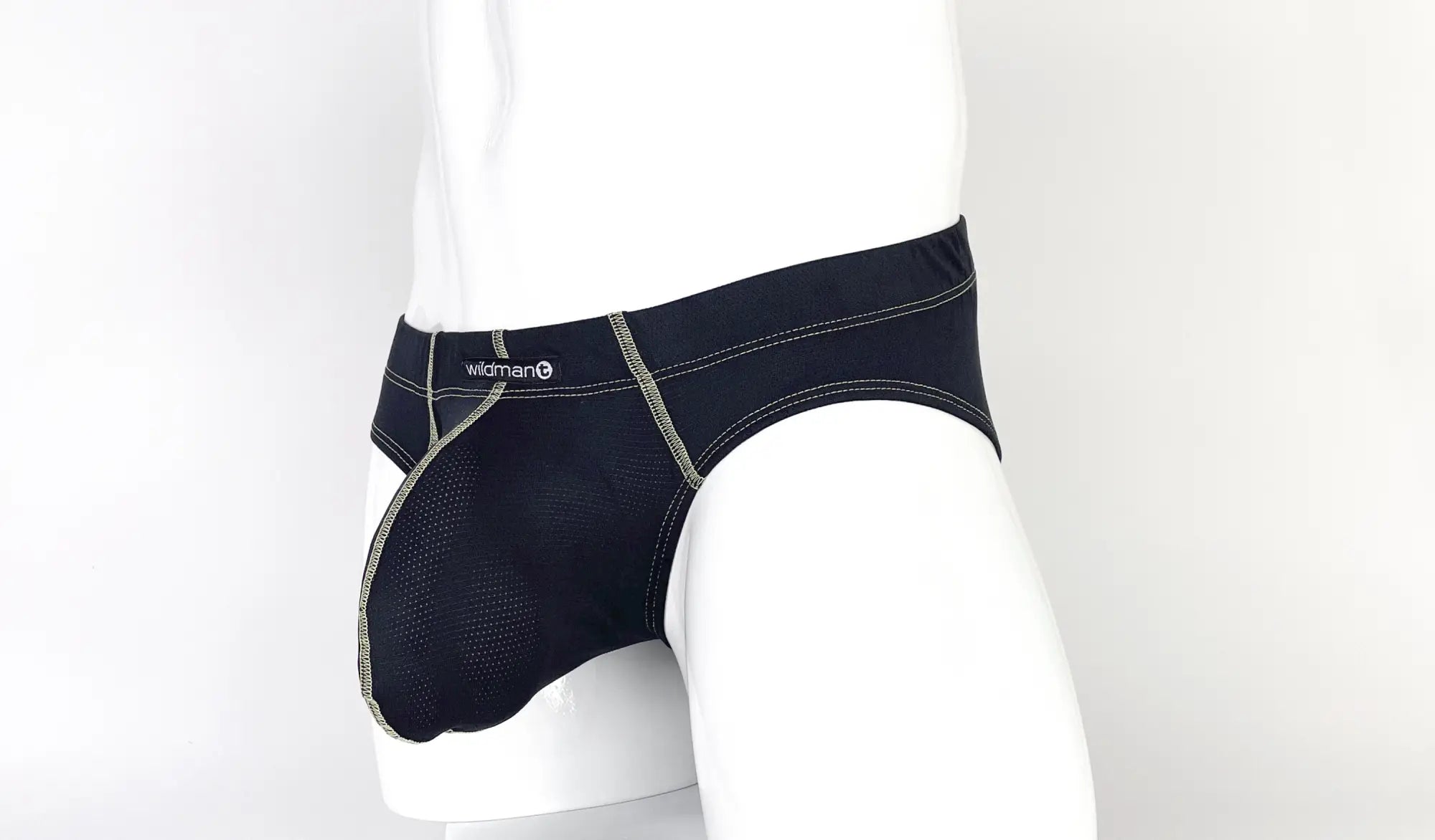 WildmanT stitch big boy pouch brief in black with mesh panel and contrasting gray stitching for breathable comfort