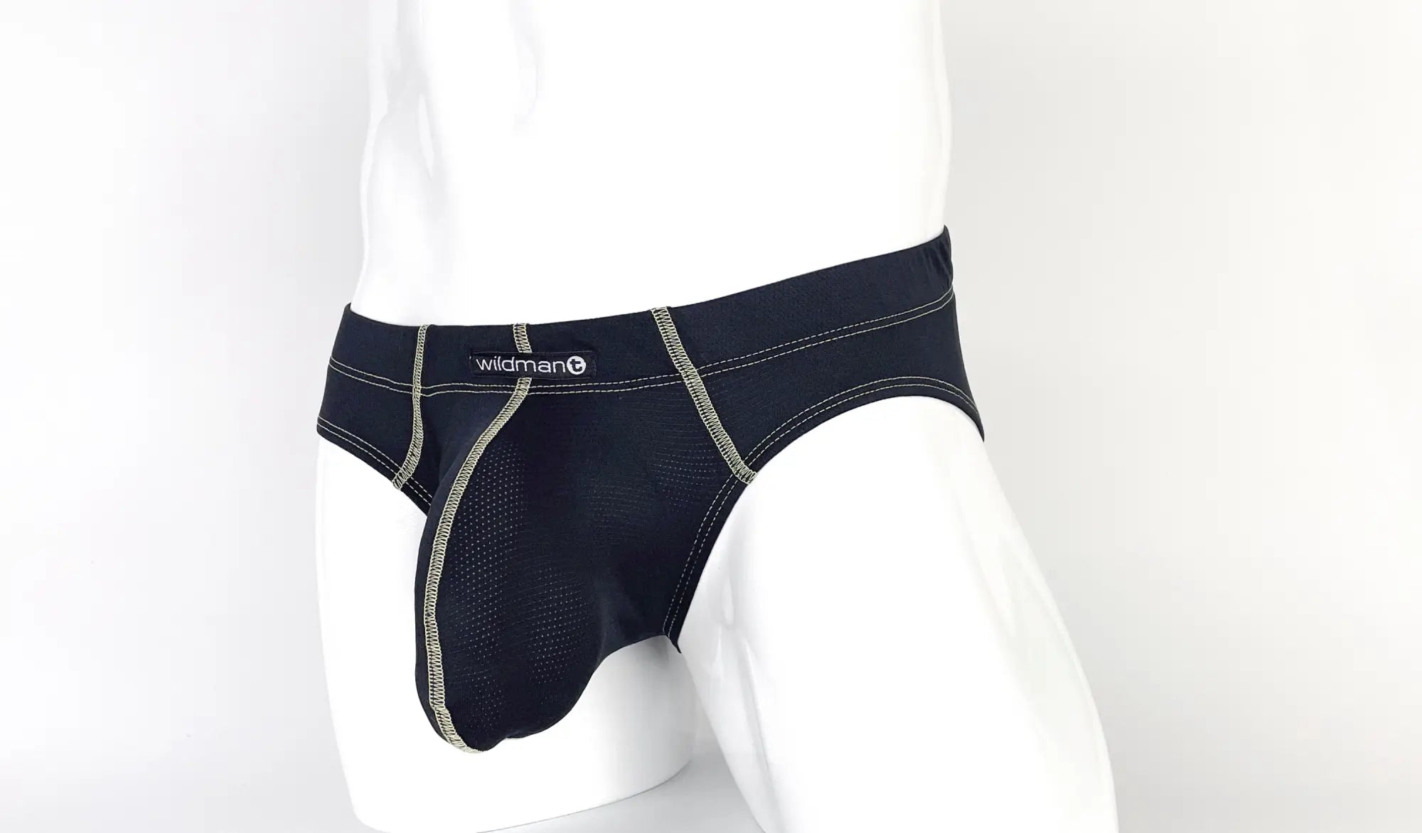Black wildman brief with silver stitching and yellow mesh panel featuring big boy pouch for enhanced support