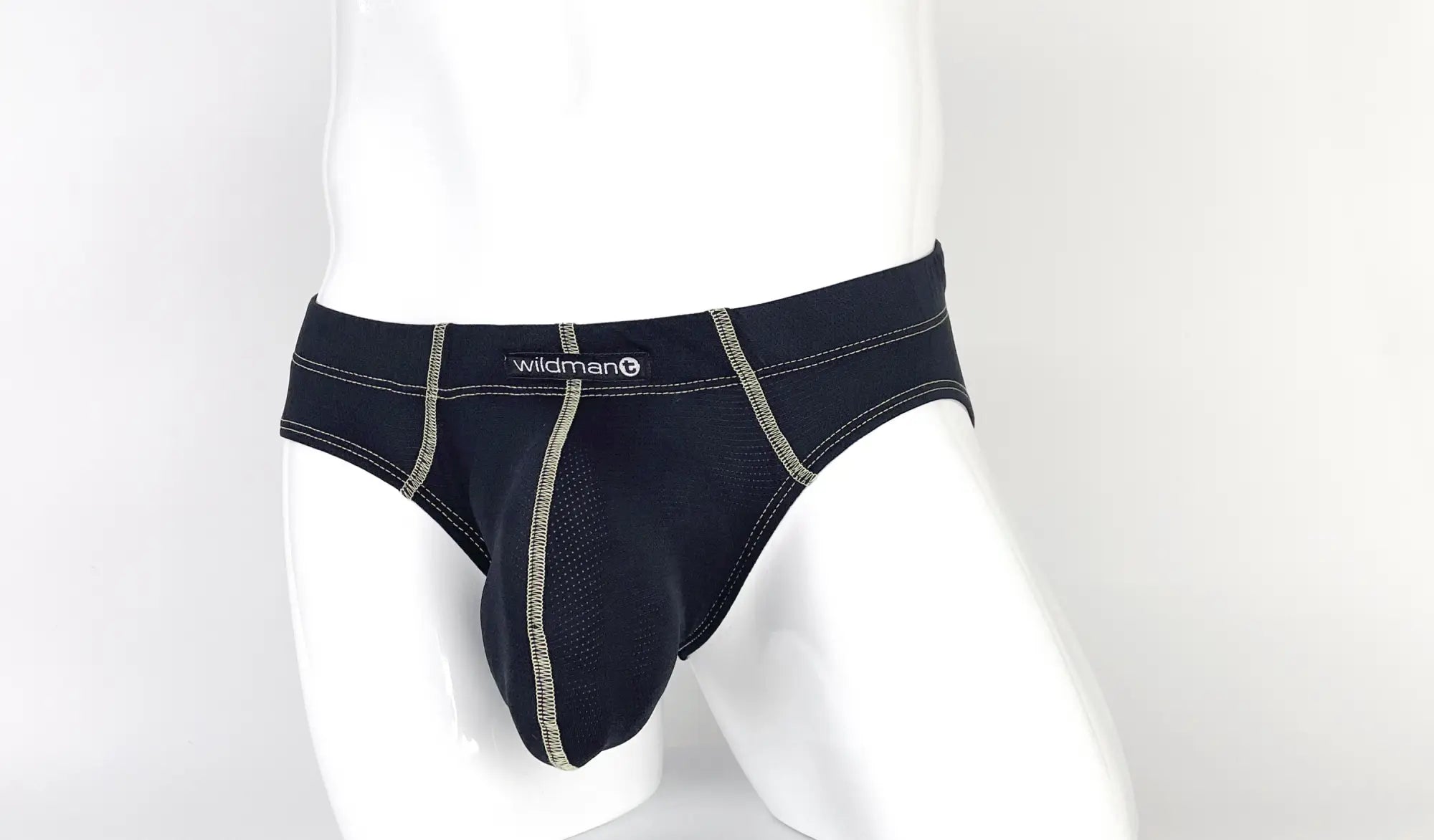 Wildmant stitch big boy pouch brief in black with silver stitching and a mesh panel for breathability