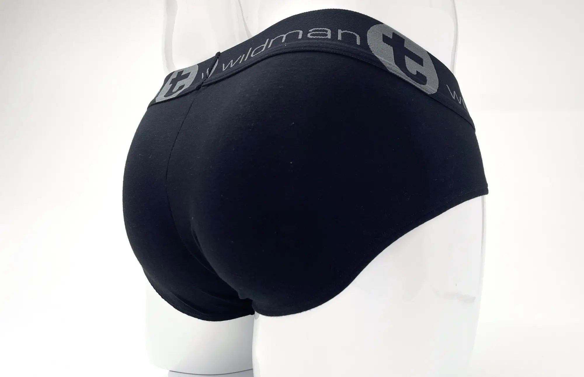 Black wildmant stretch cotton big boy pouch brief with gray waistband and circular logo emblem in black and blue