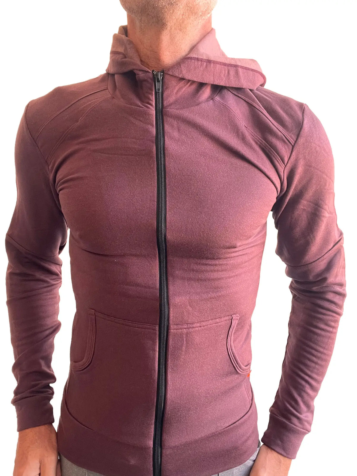A maroon mid-weight luxury-fleece form-fit zip-up hoodie with a black zipper for yoga and track activities