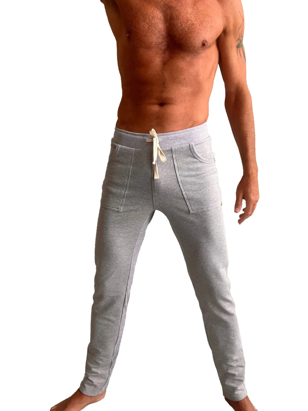Gray heathered mid-weight luxury fleece jogger pants with drawstring waist and front pockets for winter collection