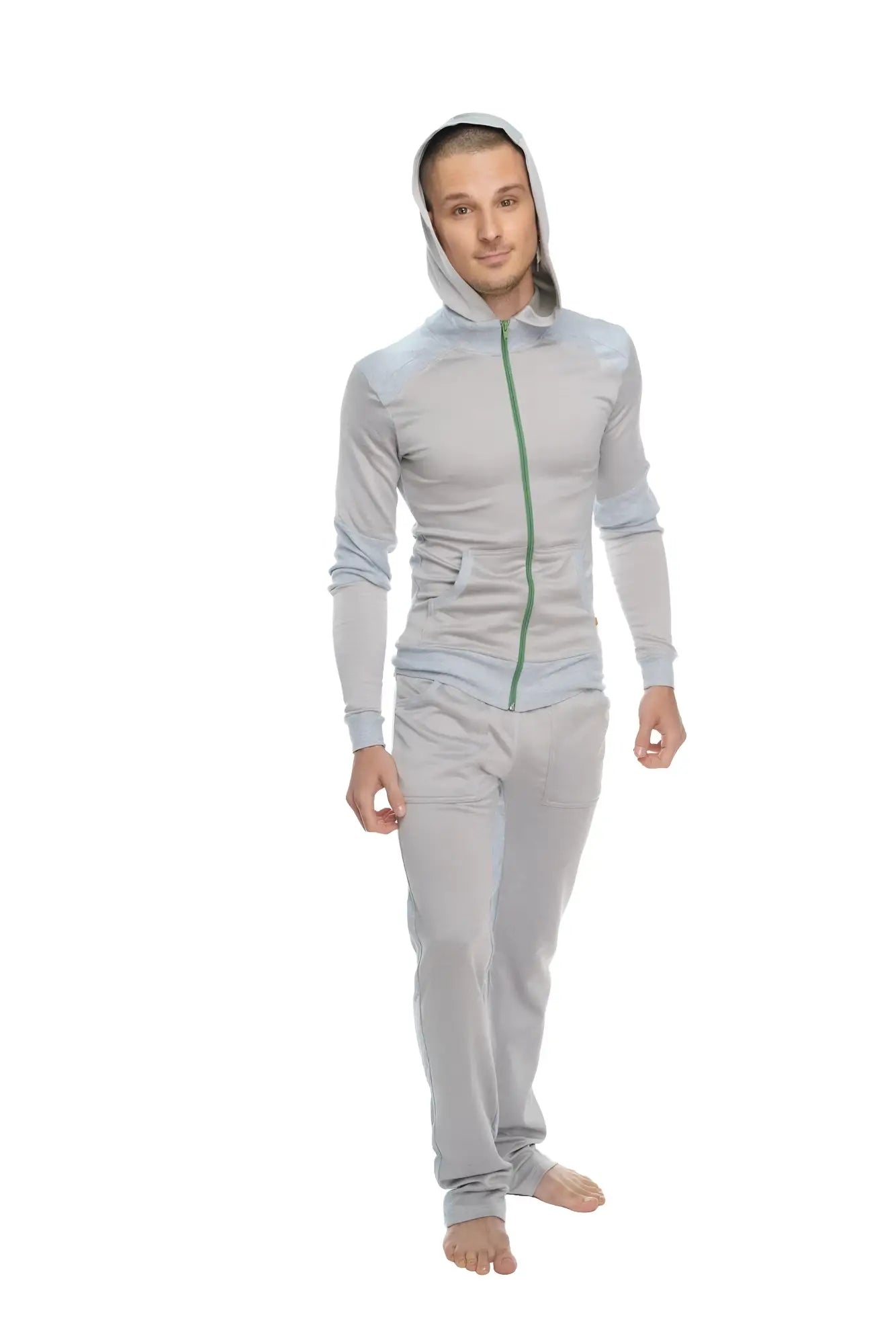 Light gray hooded zip-up tracksuit with green zipper and subtle seam detailing in mid-weight performance-luxe fleece
