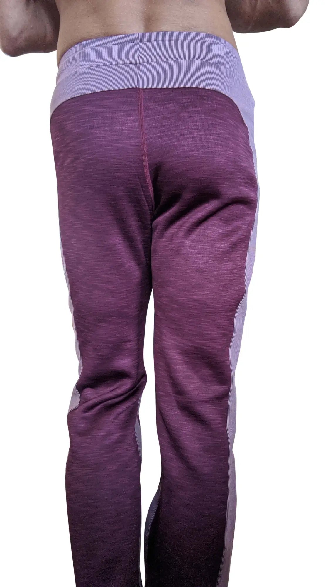 Purple and lavender thick-weight fleece track pants with ribbed waistband and side panels from winter collection