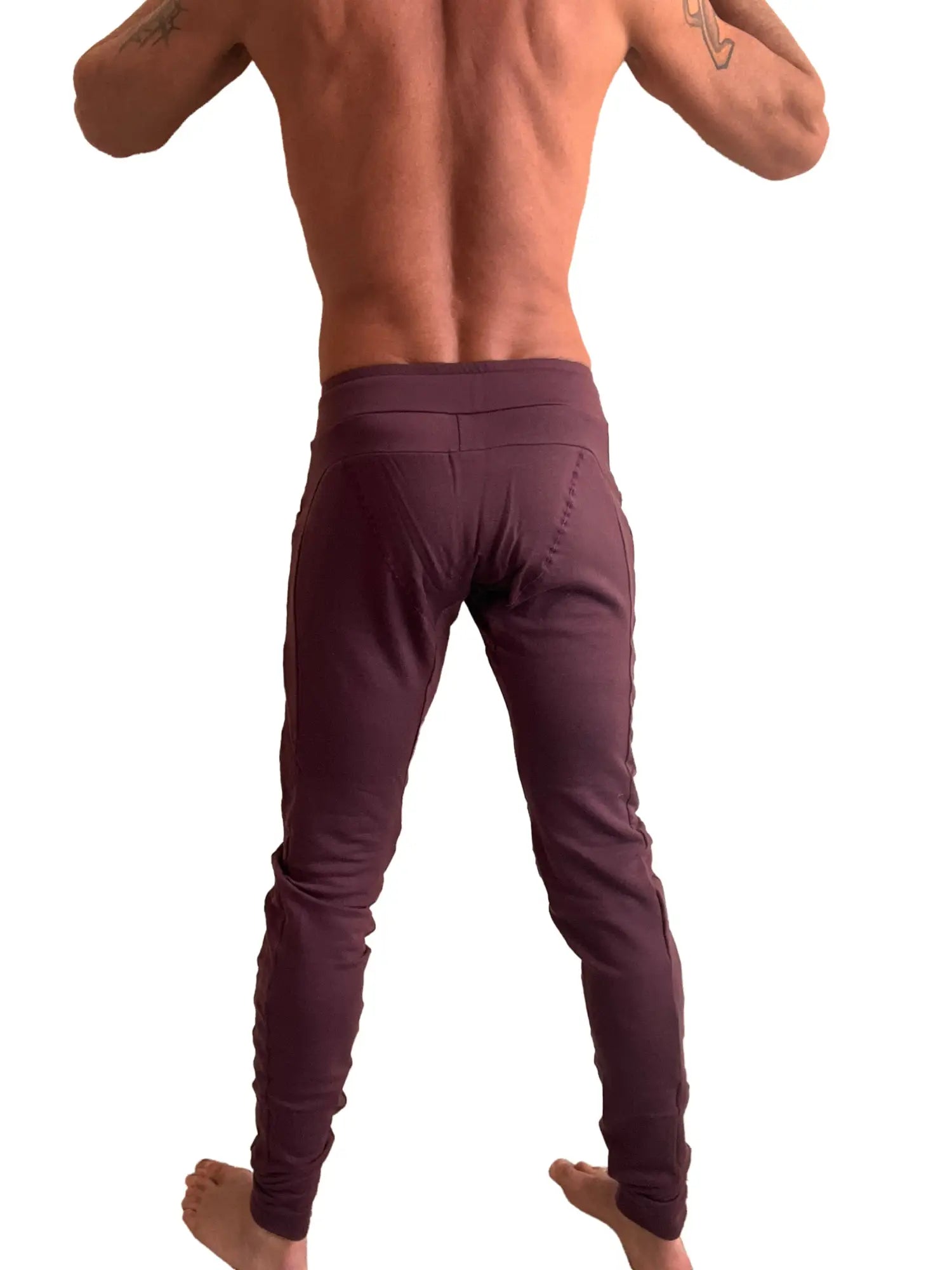 A pair of deep burgundy winter edition luxury fleece jogger and yoga sweat pants with high waistband and side seam detailing