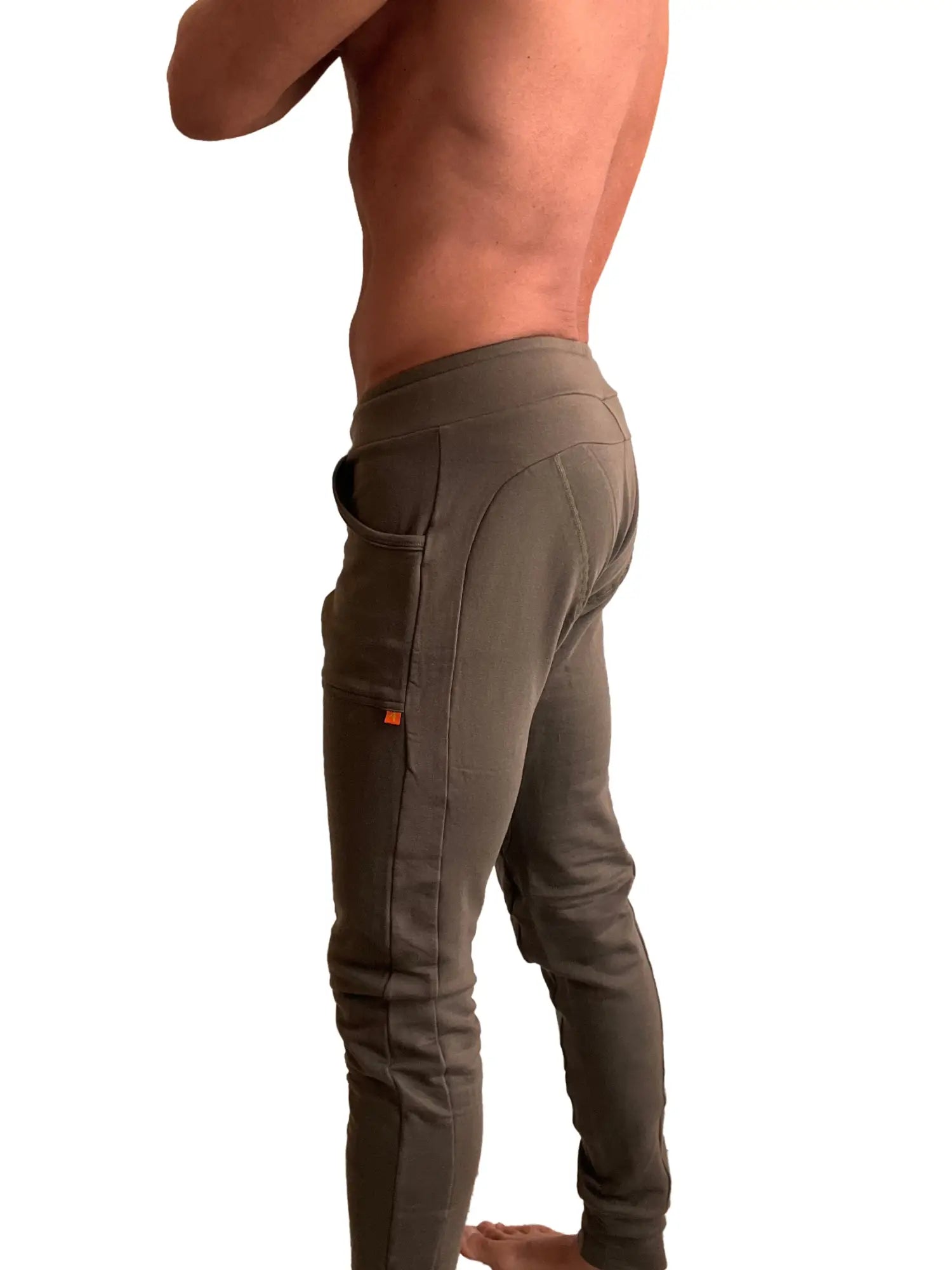 Olive green winter edition luxury-fleece jogger pants with a snug fit and side pockets for athletic use