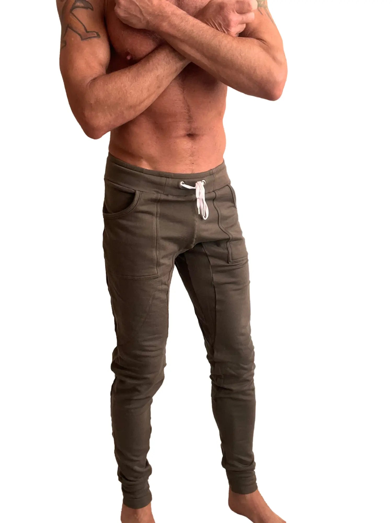 Olive green luxury fleece jogger pants with white drawstring and side pockets from winter edition collection