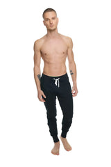 Black luxury-fleece long cuffed joggers with white drawstrings and elastic cuffs winter edition pants