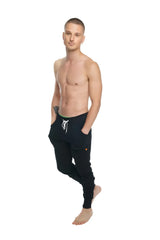 Winter edition luxury-fleece black jogger pants with white drawstring and orange logo detailing on lower leg